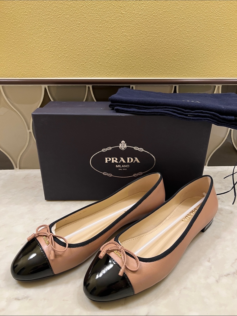 Prada Two-Tone Blush Tan and Black Cap-Toe Leather Ballet Flats